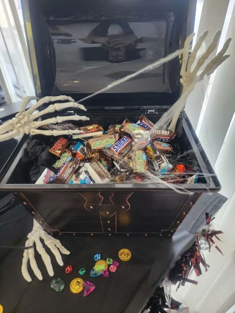 Treasure chest full of Halloween candy at the Spine and Injury Associates Haines City clinic