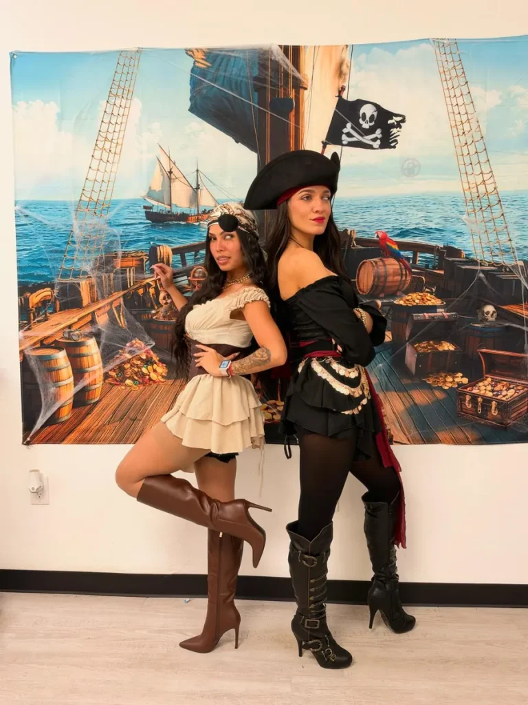 Two Spine and Injury Associates Haines City team members in pirate costumes for Halloween 2026