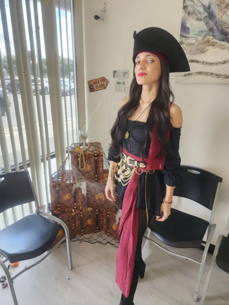 Spine and Injury Associates Haines City team member in a pirate costume in the waiting room