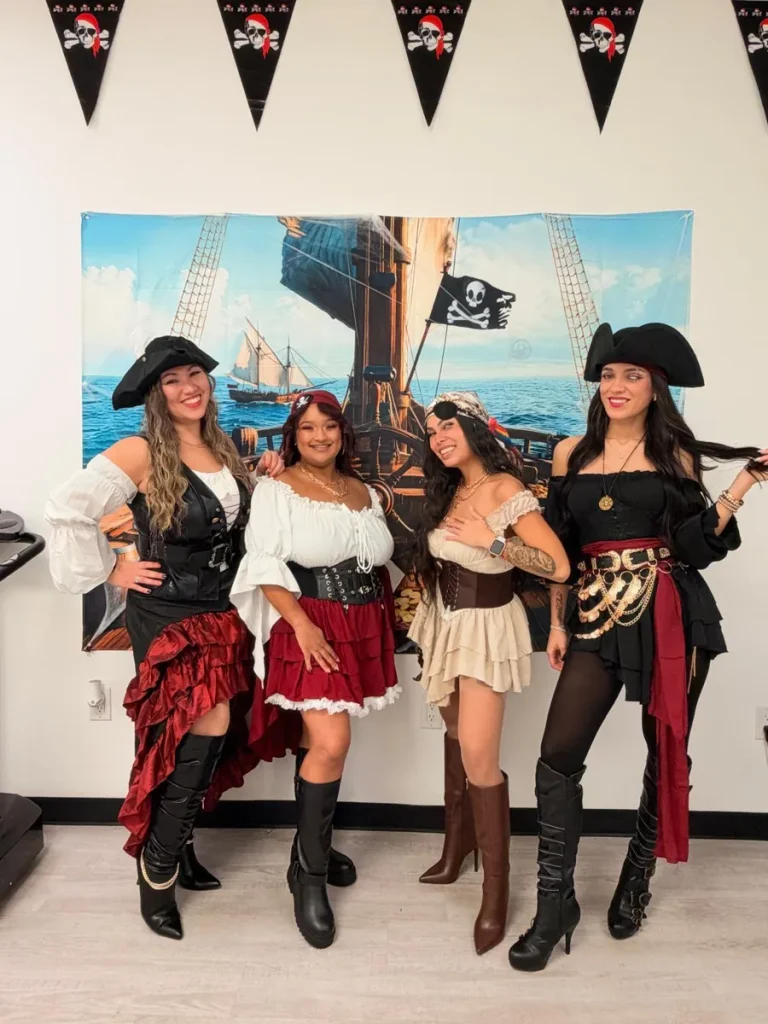 Spine and Injury Associates Haines City team dressed as pirates for Halloween 2026