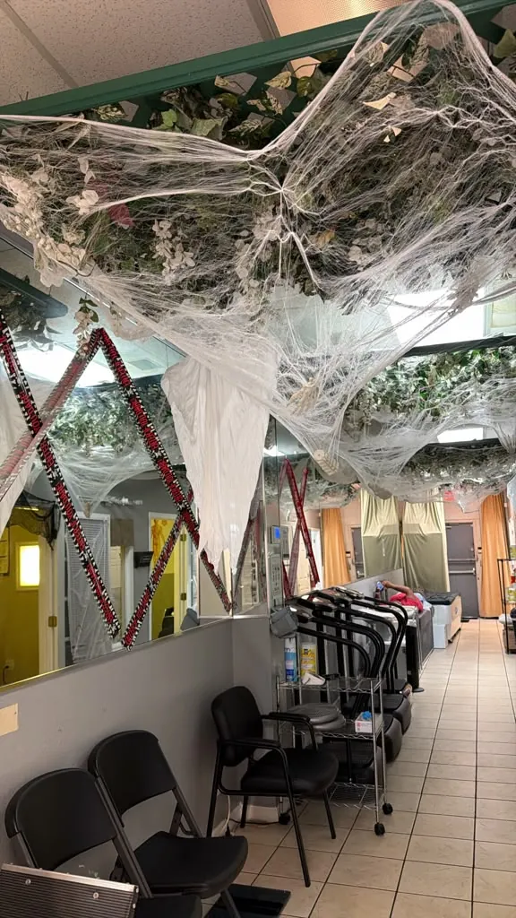 Spider web Halloween decorations in the hallway of the Spine and Injury Associates Orlando clinic