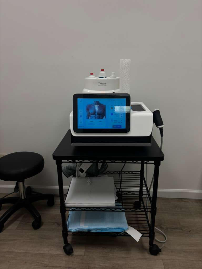 Therapy device in a treatment room at the Fort Myers clinic