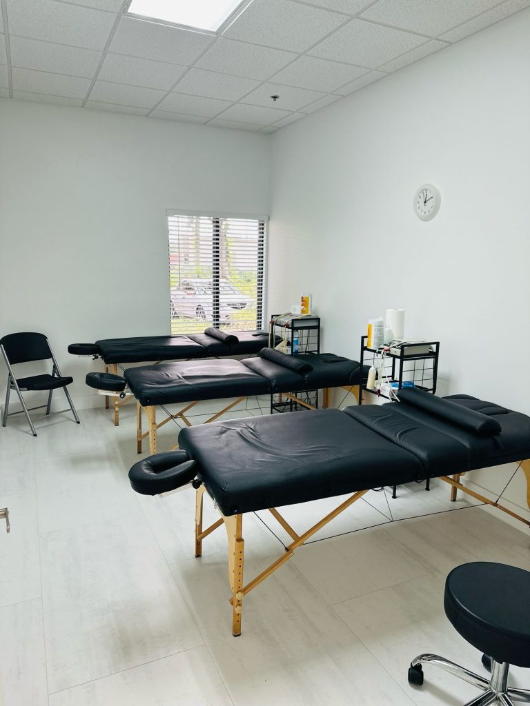 Treatment tables in the therapy room at Spine and Injury Associates Kissimmee