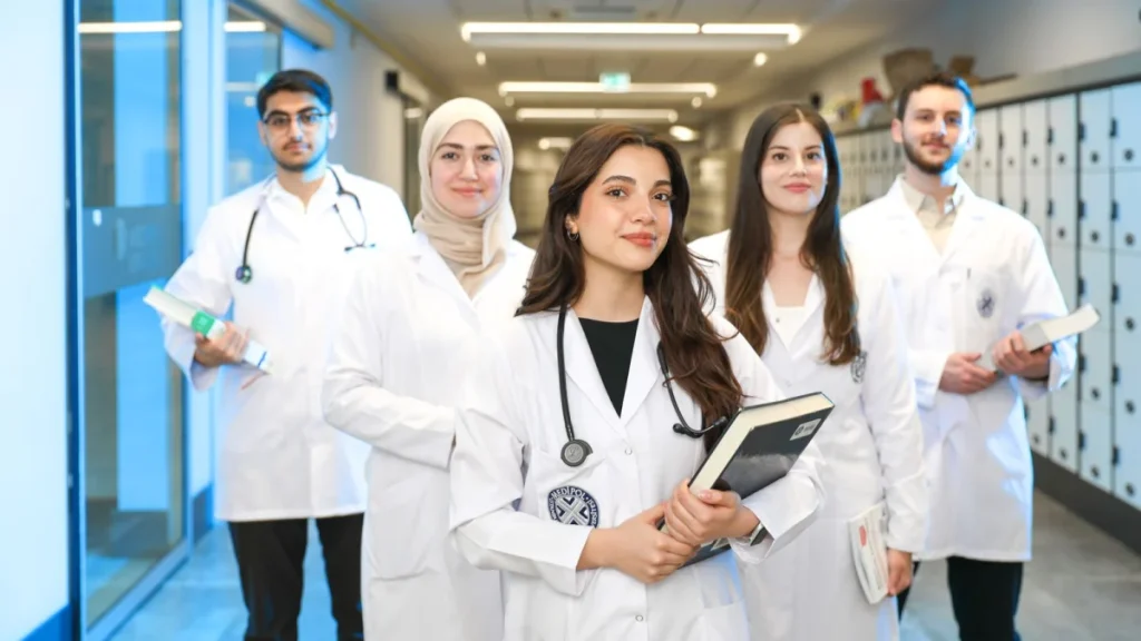 Young students walking a university hallway toward a career in chiropractic care