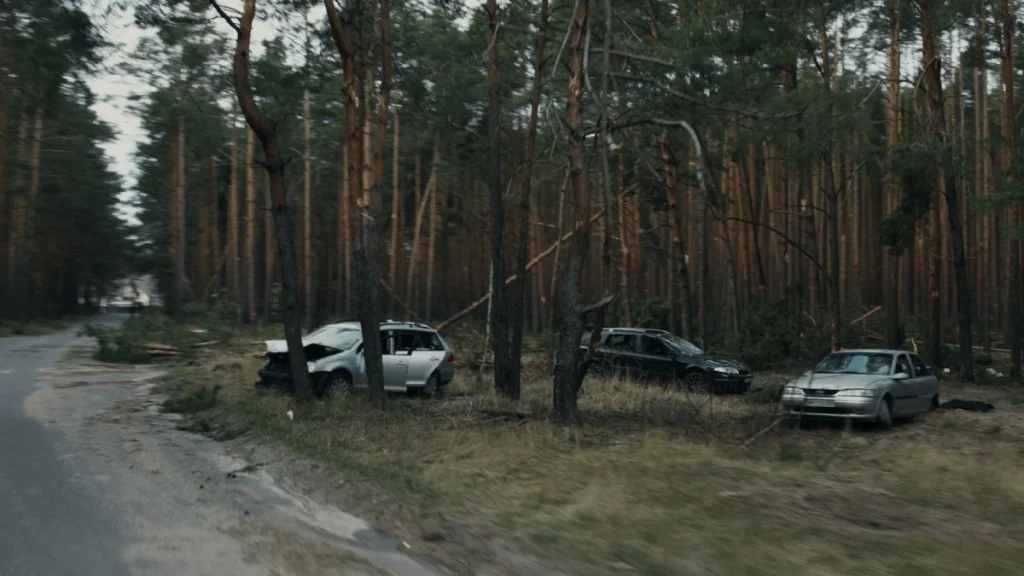 Three damaged cars after a collision, a common cause of whiplash