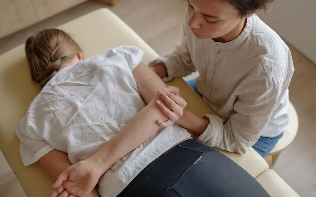 Woman receiving chiropractic therapy on a treatment table to speed recovery